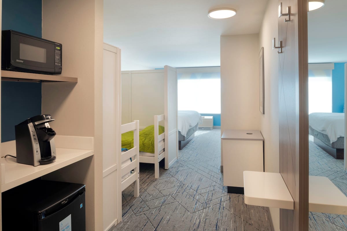 Suite, Multiple Beds | In-room safe, desk, iron/ironing board, free cots/infant beds