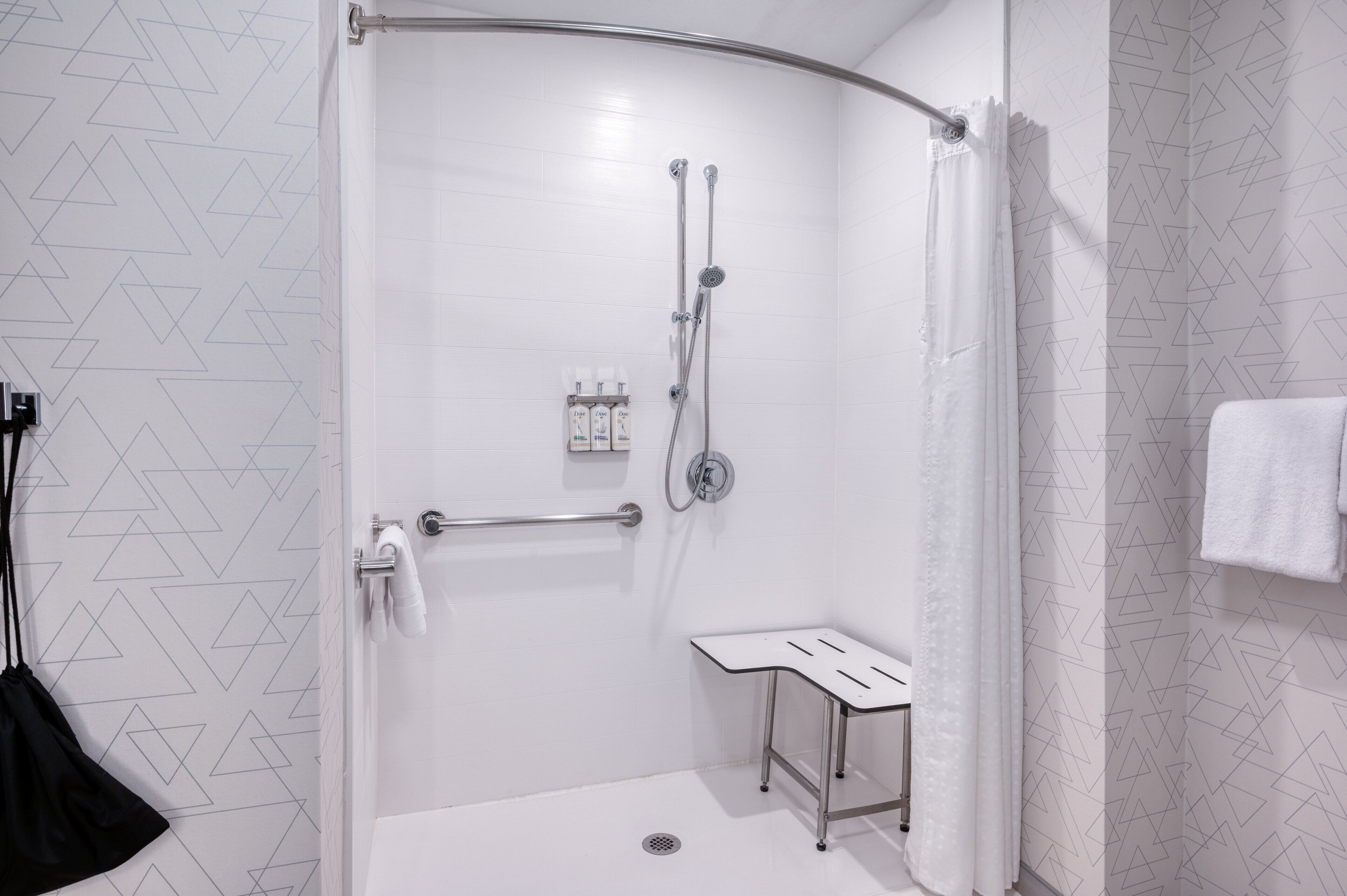 standard room, 1 king bed, accessible (roll-in shower) | bathroom | hair dryer, towels, soap, shampoo