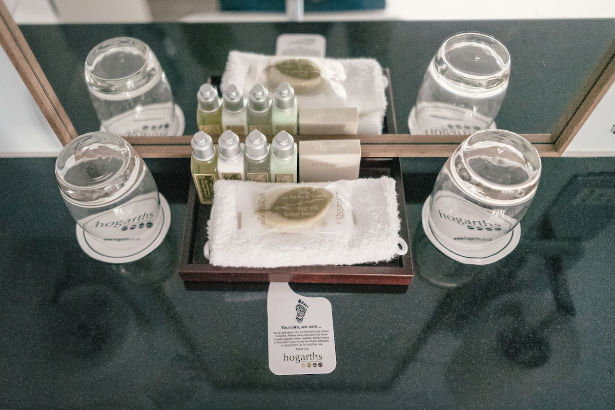 free toiletries, hair dryer, heated floors, towels