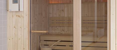 Una sala de sauna con paredes de madera, una puerta de cristal y un panel de control.