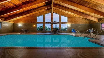 Indoor pool, open 8 AM to 10:00 PM, pool loungers