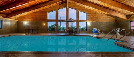 Indoor pool, open 8 AM to 10:00 PM, pool loungers