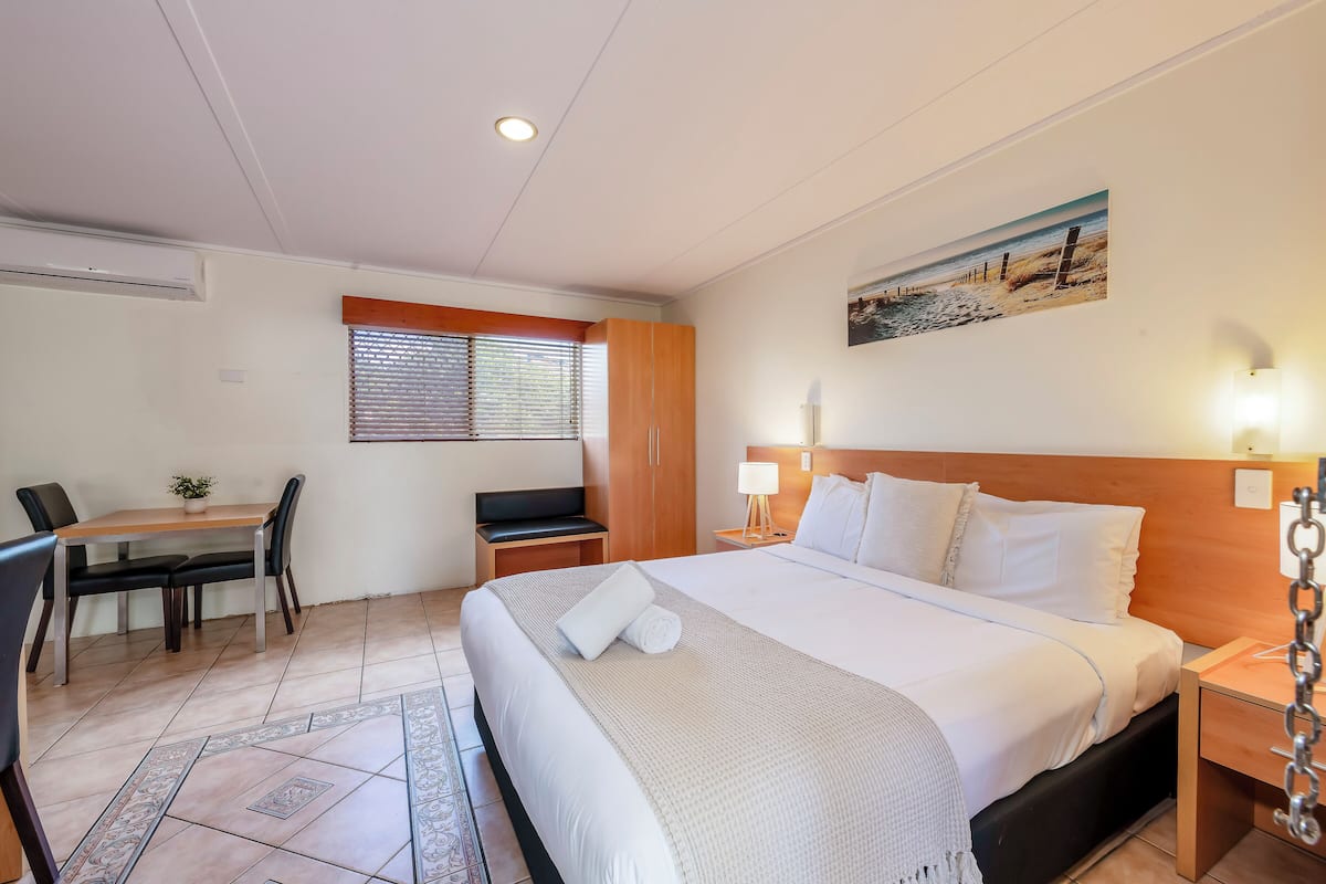 Family Suite | Living area | 30-cm LCD TV with satellite channels, TV