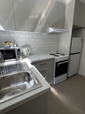 Appartement Deluxe | Coffres-forts dans les chambres, bureau, fer et planche à repasser