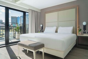 Premium bedding, down comforters, pillowtop beds, minibar