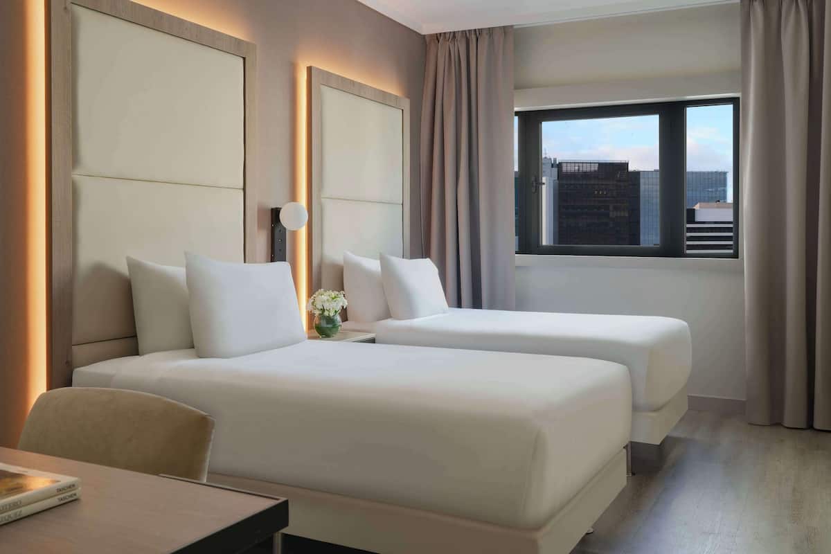 Premium bedding, down duvets, pillow-top beds, minibar