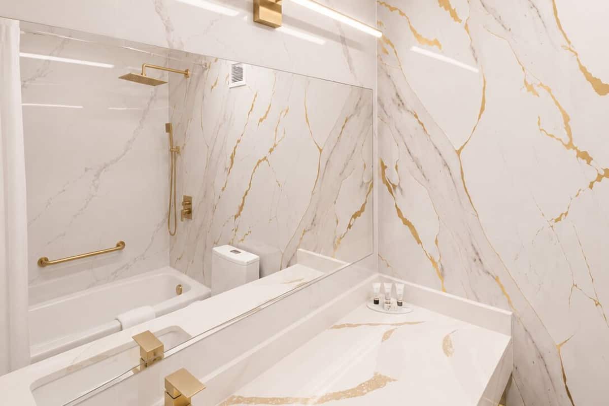 Designer toiletries, hair dryer, towels