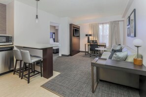 Suite, 1 Bedroom | Living area | 32-inch flat-screen TV with satellite channels, TV, pay movies