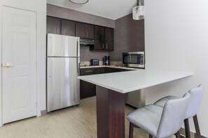 1 bedroom, desk, blackout drapes, iron/ironing board