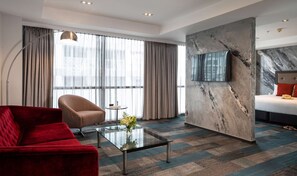 Executive Suite, 1 King Bed | Premium bedding, minibar, in-room safe, desk