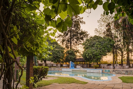 Outdoor pool. Kadoma Hotel And Conference Center