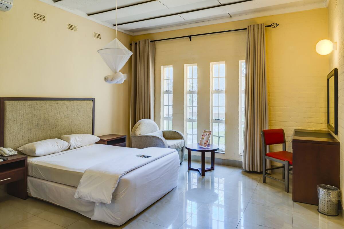 Villa Double Room | Minibar, in-room safe, iron/ironing board (on request), cribs (free)
