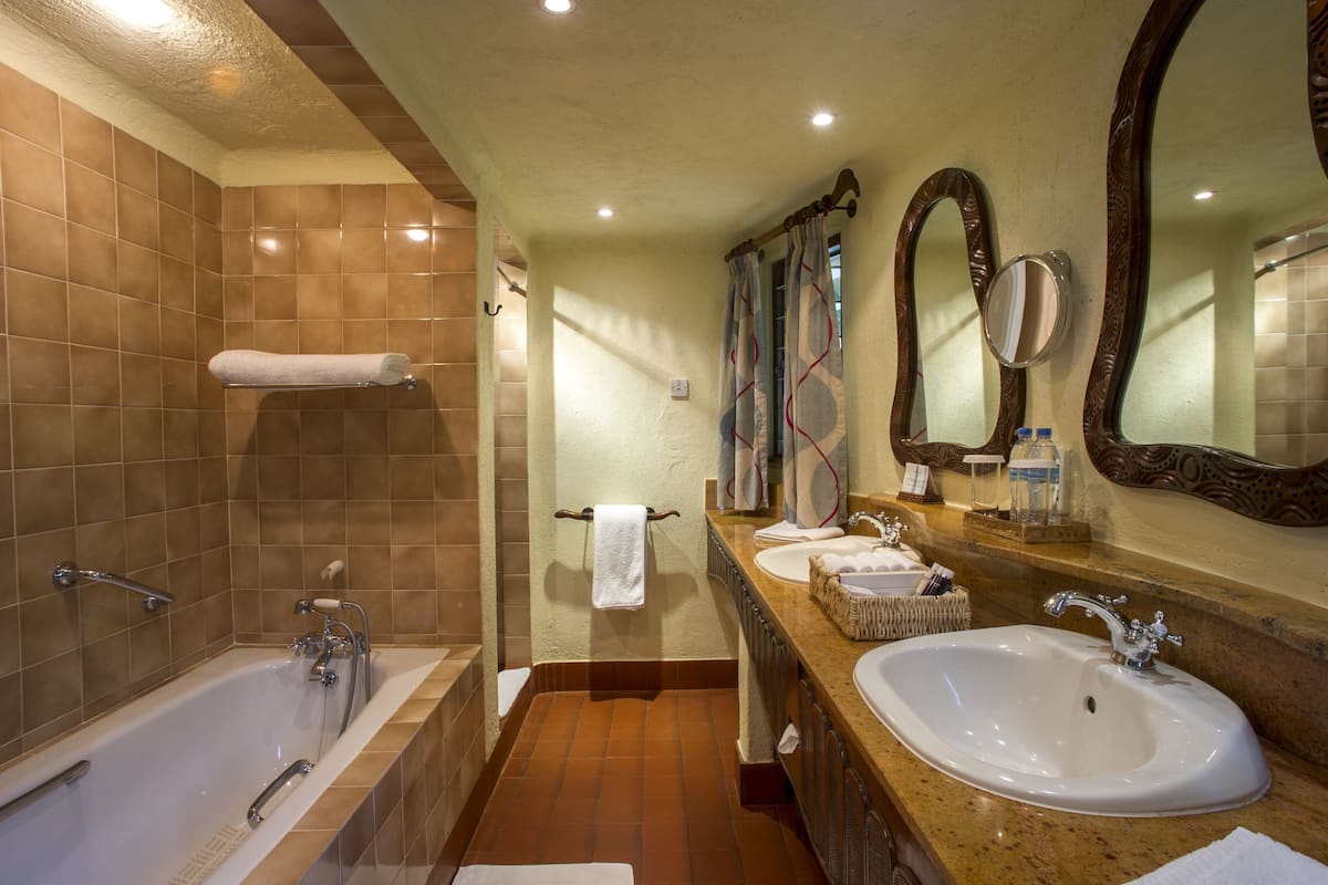 standard room | bathroom | shower, designer toiletries, hair dryer, bathrobes