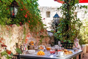Daily buffet breakfast (EUR 35 per person)