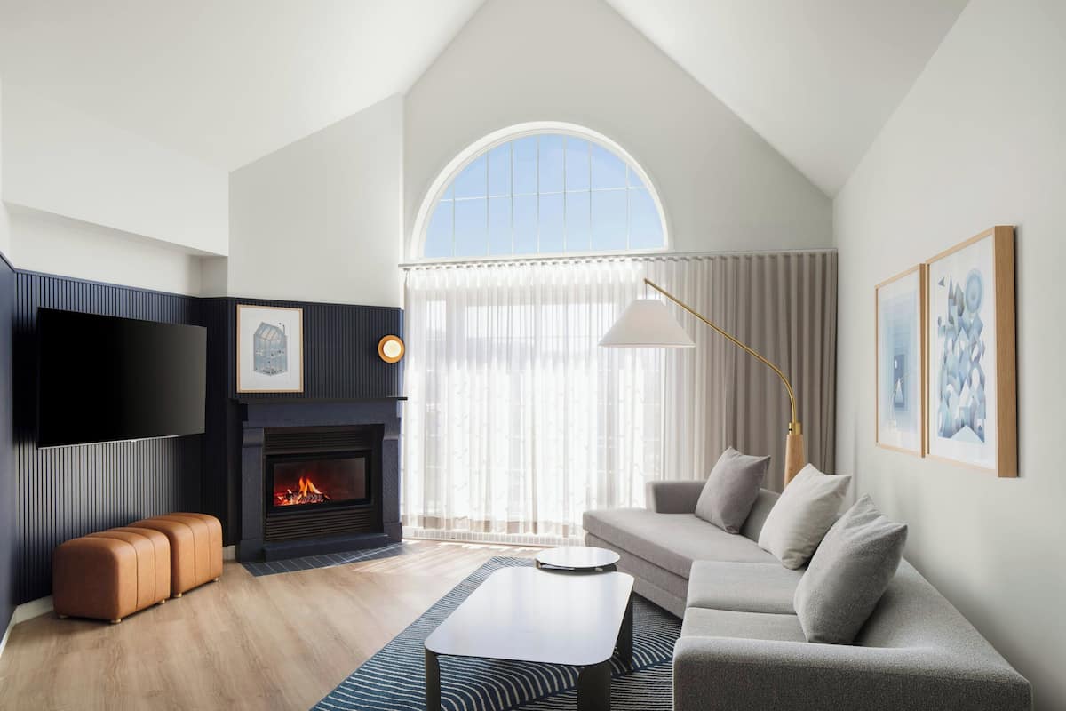 Suite, 1 Bedroom, Non Smoking, Fireplace | Living room | 32-inch flat-screen TV with cable channels, TV