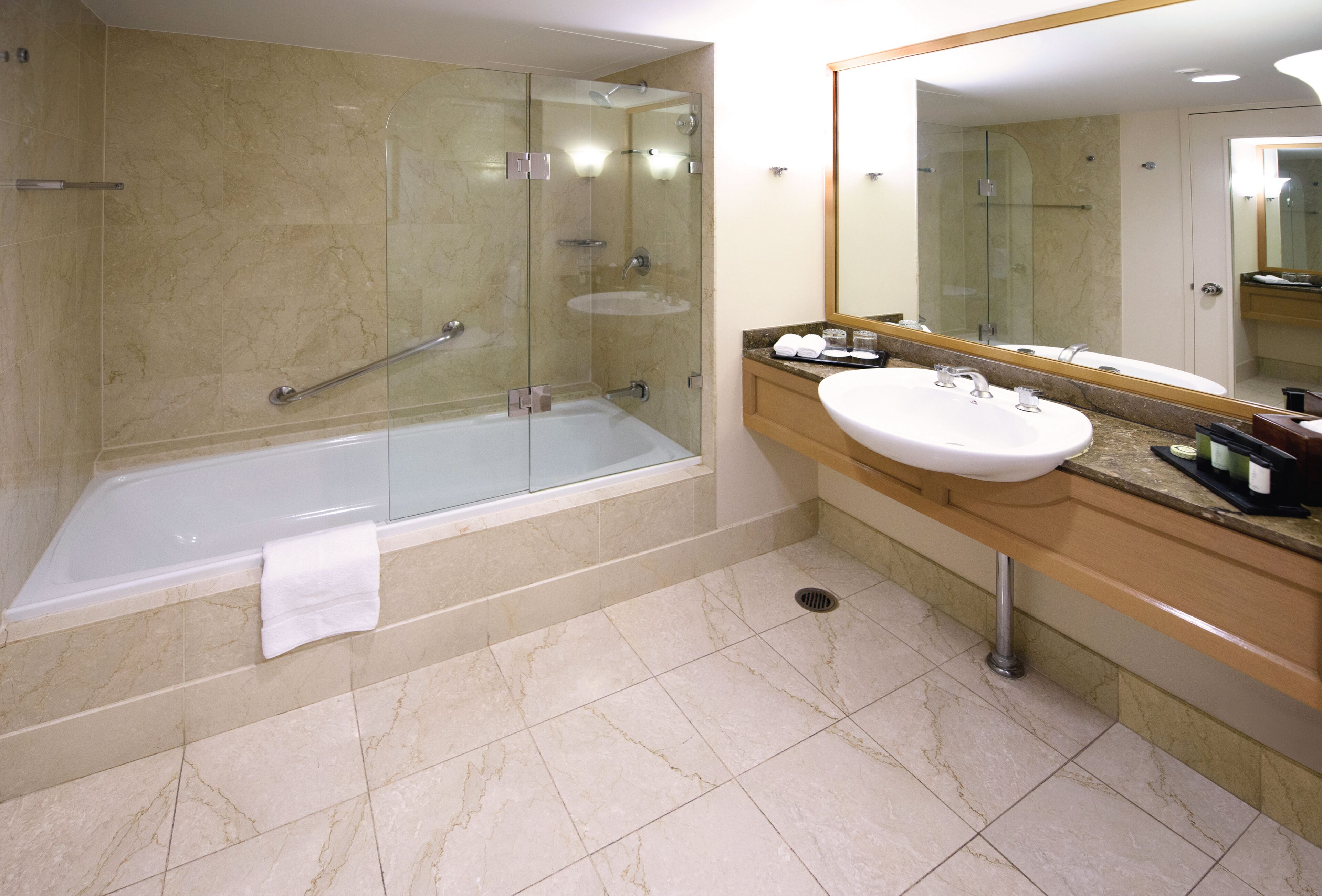 combined shower/bathtub, deep-soaking bathtub, designer toiletries