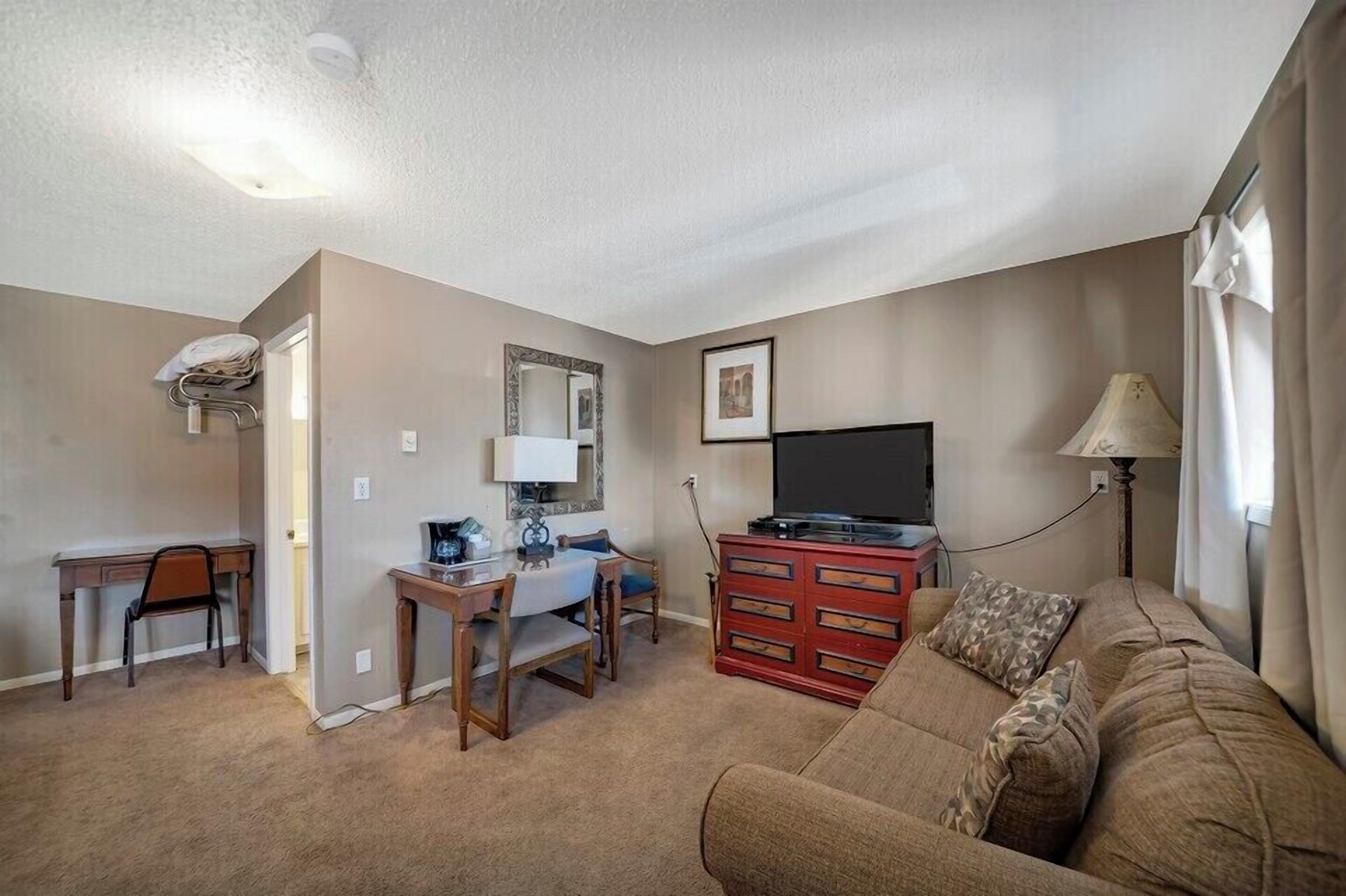 Desk, blackout drapes, free WiFi, bed sheets