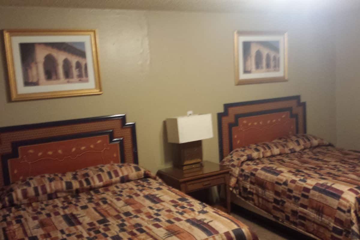 Desk, blackout drapes, free WiFi, bed sheets