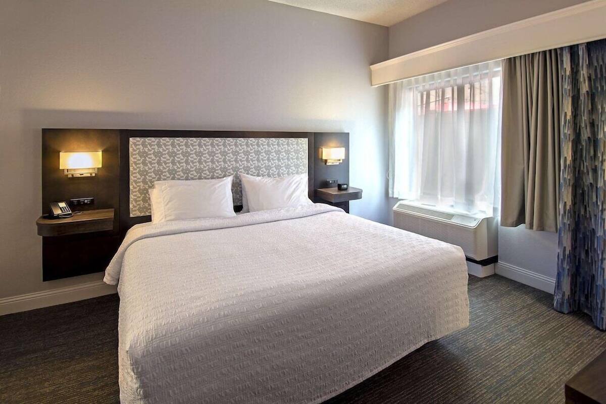 In-room safe, desk, blackout curtains, iron/ironing board