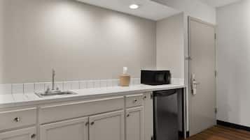 Suite, 1 King Bed with Sofa bed, Non Smoking | Desk, laptop workspace, blackout drapes, soundproofing