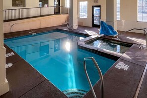 Indoor pool, open 7:00 AM to 10:00 PM, pool loungers