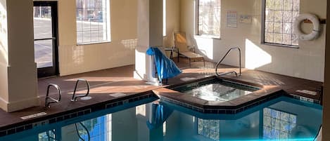 Indoor pool, open 7:00 AM to 10:00 PM, pool loungers