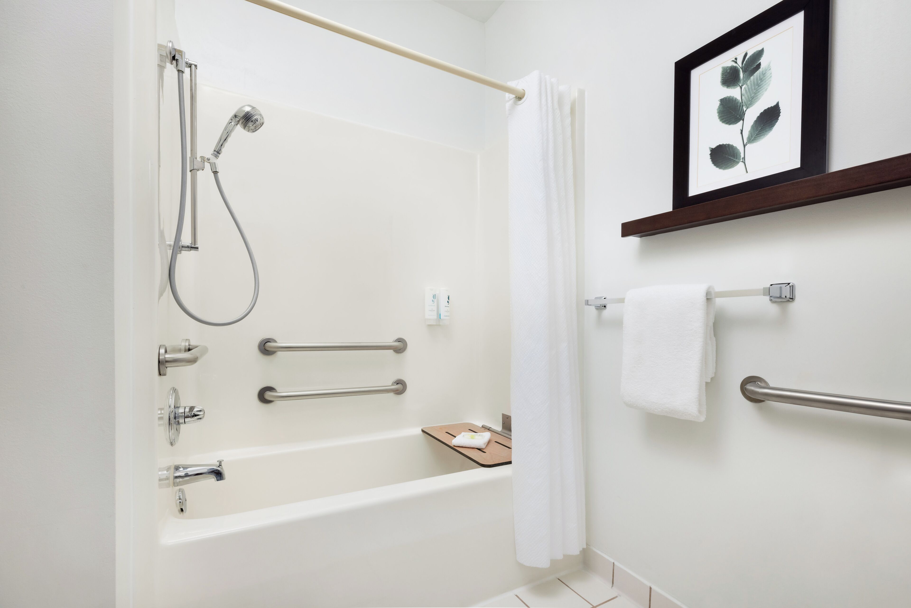 combined shower/bathtub, free toiletries, hair dryer, towels