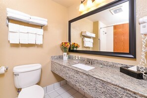 Shower, eco-friendly toiletries, hair dryer, towels