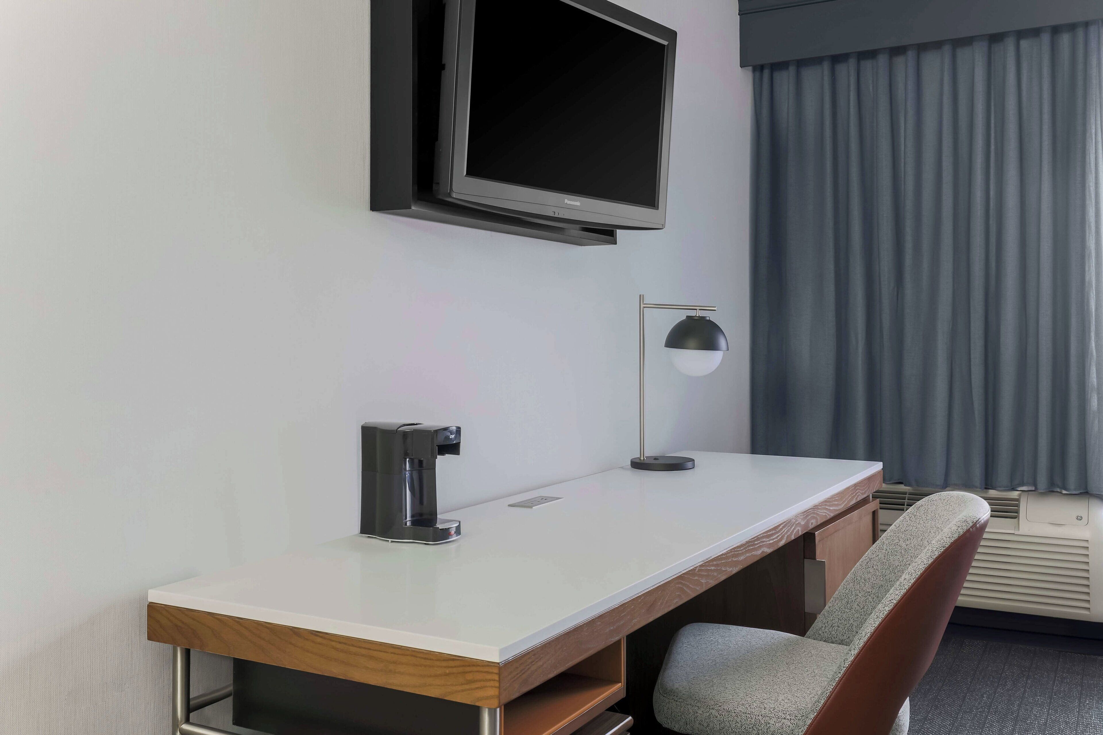 desk, blackout curtains, iron/ironing board, free cots/infant beds