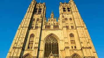 A large Gothic cathedral with twin towers and a central rose window.