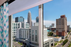 A cityscape with modern buildings, a prominent skyscraper, and a clear sky. - Hilton Garden Inn Charlotte Uptown (Charlotte)