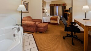 Suite, 1 King Bed, Non Smoking, Jetted Tub | 1 bedroom, in-room safe, blackout drapes, iron/ironing board