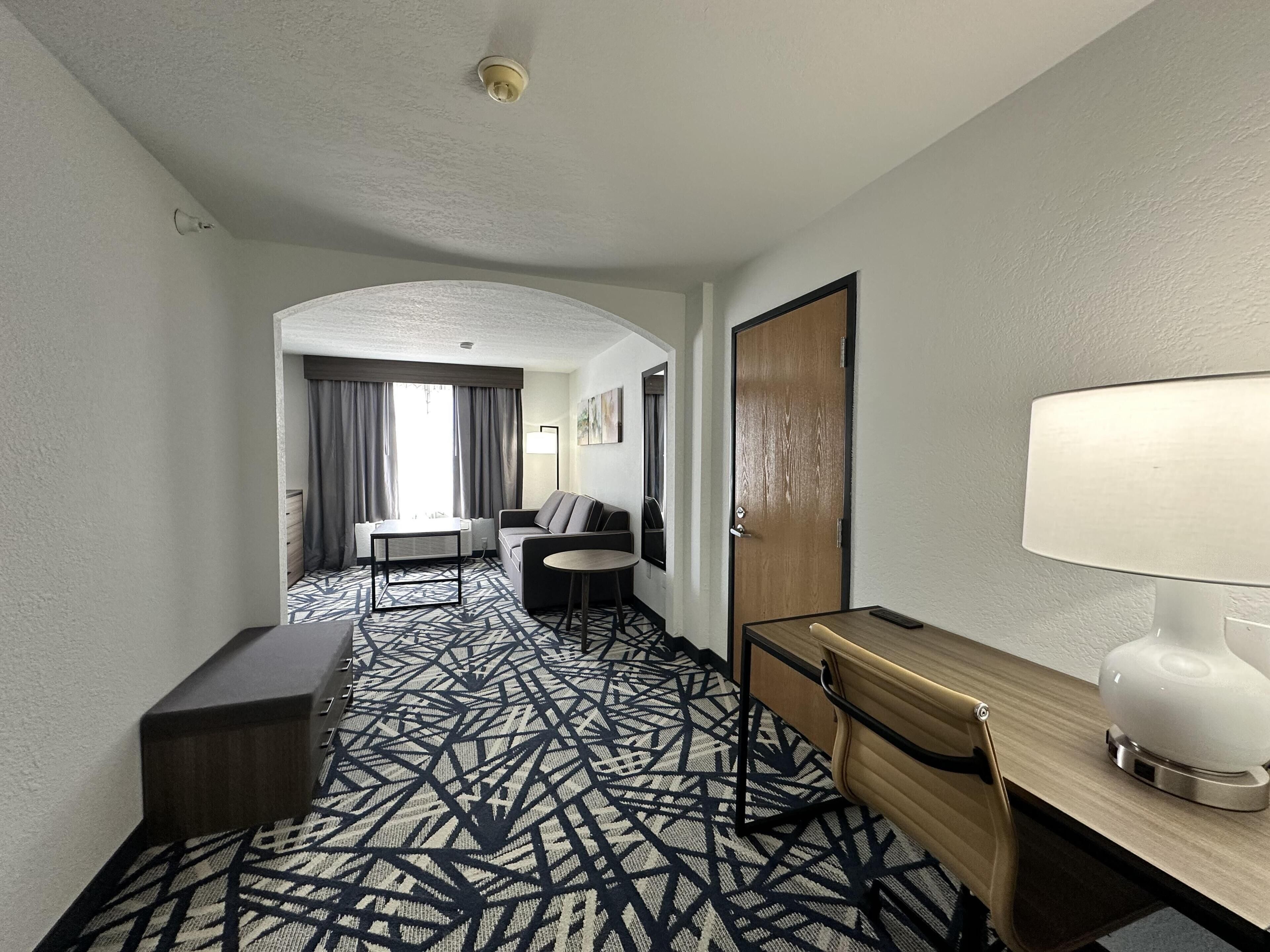 Desk, blackout drapes, iron/ironing board, rollaway beds