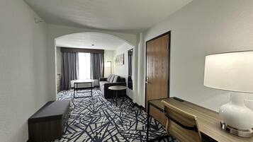 Desk, blackout drapes, iron/ironing board, rollaway beds