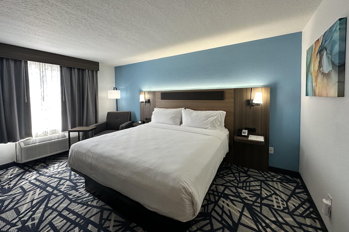Desk, blackout drapes, iron/ironing board, rollaway beds
