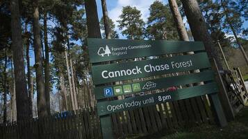A sign for Cannock Chase Forest, indicating it is managed by the Forestry Commission England.