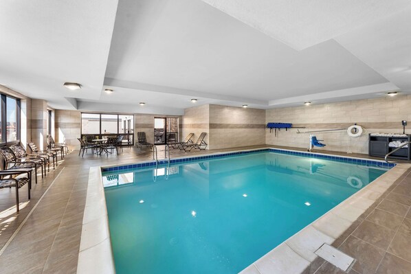 Indoor pool, open 7:00 AM to 10:00 PM, pool loungers