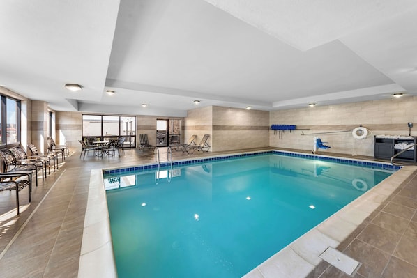 Indoor pool, open 7:00 AM to 10:00 PM, pool loungers