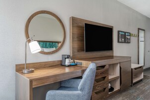 Desk, laptop workspace, blackout drapes, iron/ironing board