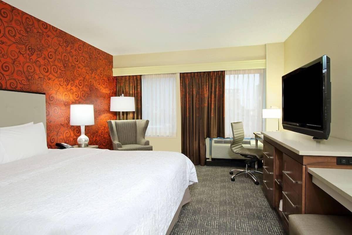 Hypo-allergenic bedding, pillow-top beds, in-room safe