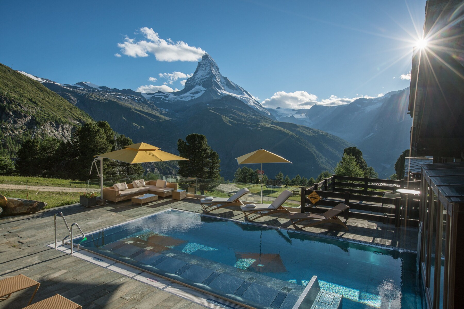 Indoor pool, outdoor pool, pool umbrellas, sun loungers