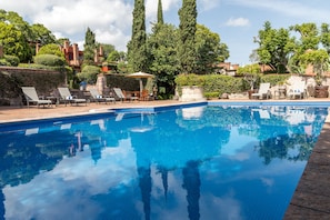Outdoor pool, pool umbrellas, pool loungers