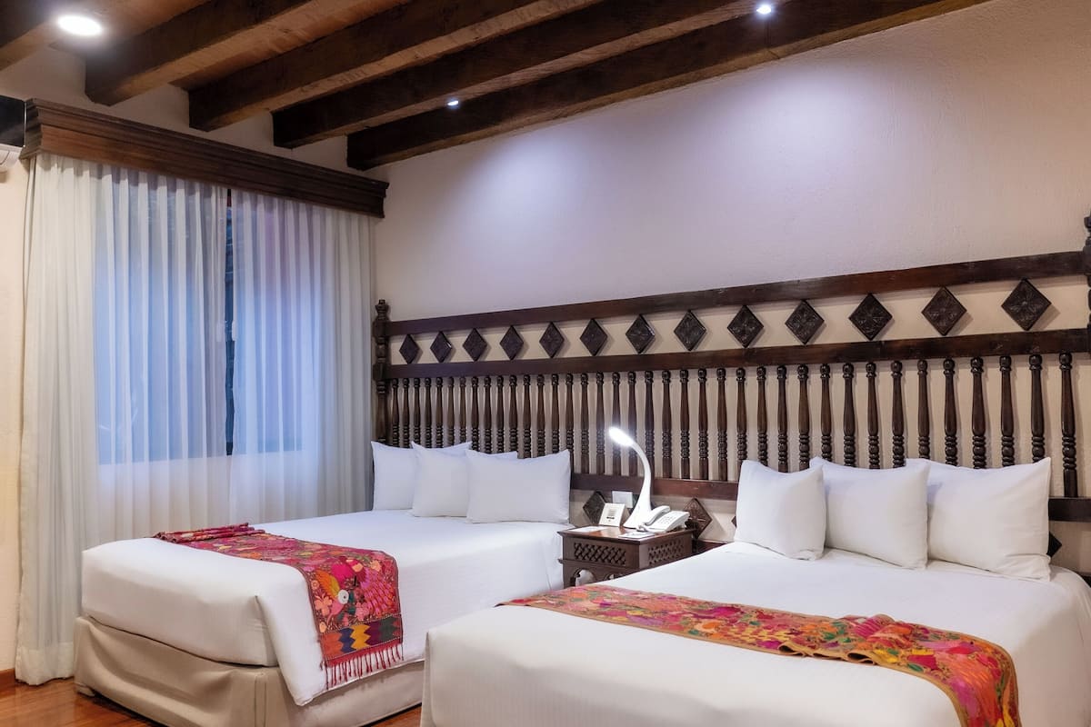 junior suite, 2 double beds | premium bedding, down duvets, in-room safe, individually furnished
