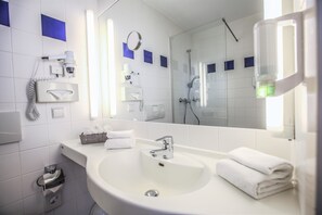 Shower, free toiletries, hair dryer, towels