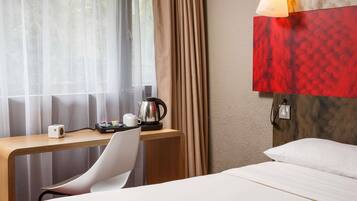 Memory-foam beds, desk, blackout curtains, free WiFi