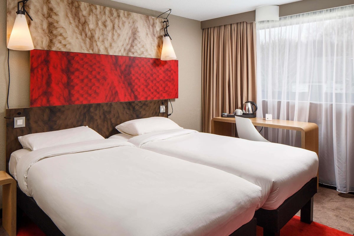 Memory-foam beds, desk, blackout curtains, free WiFi