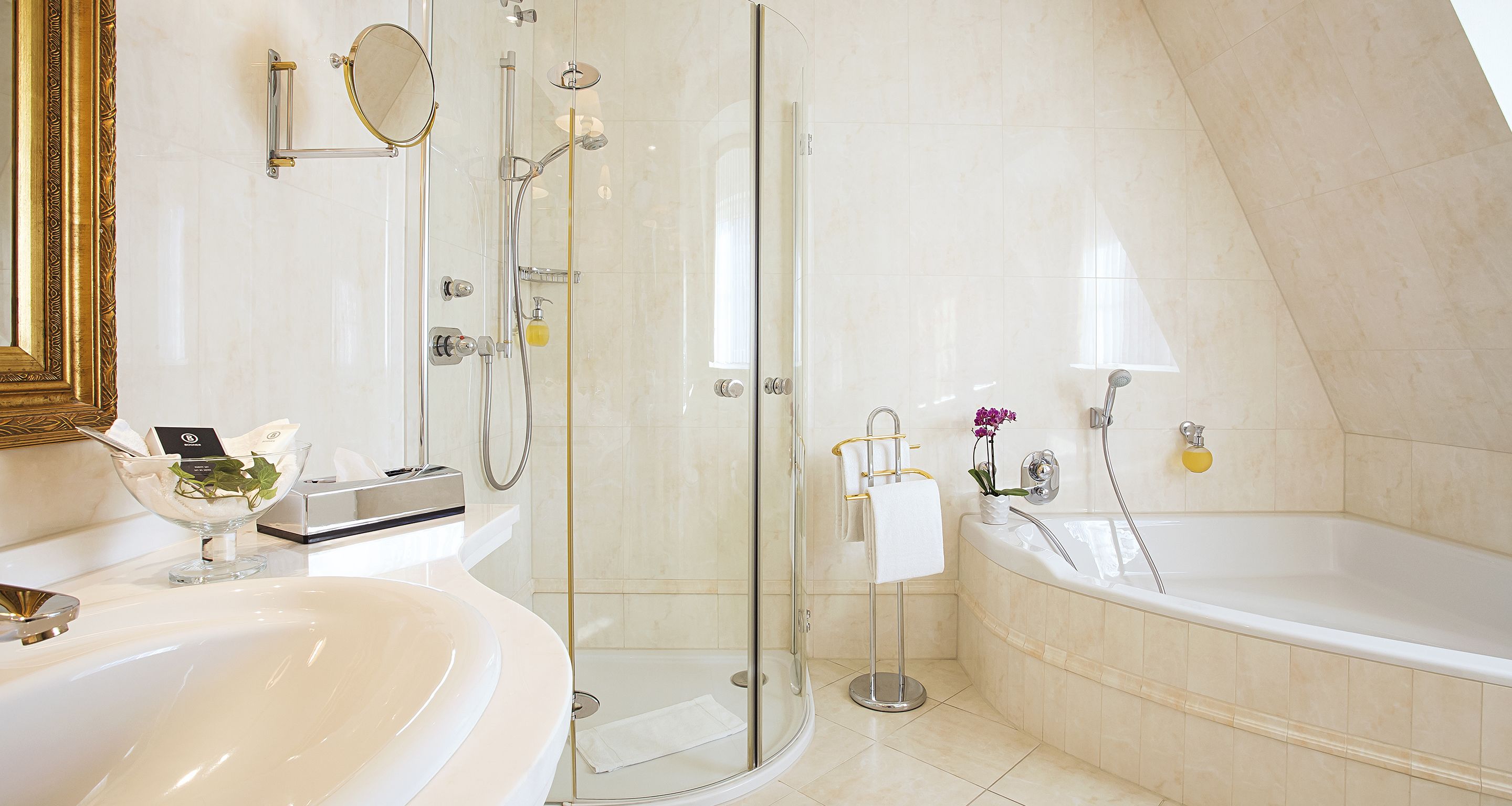 junior suite | bathroom | eco-friendly toiletries, hair dryer, towels