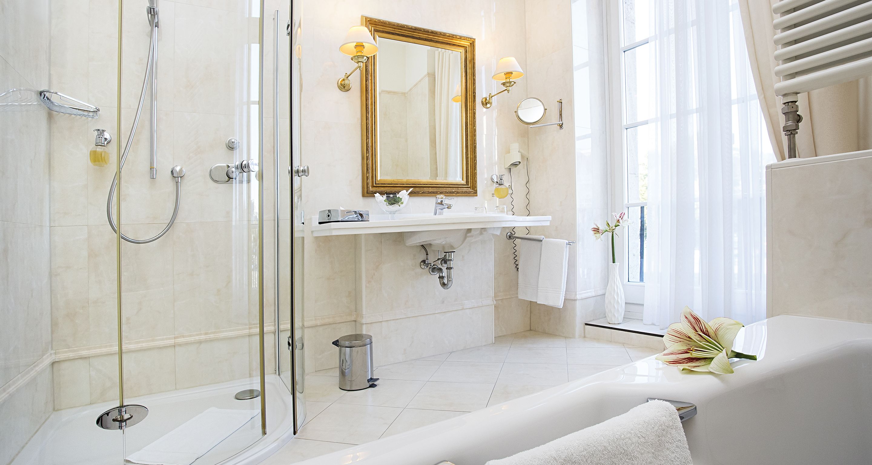 junior suite | bathroom | eco-friendly toiletries, hair dryer, towels