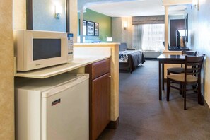 Suite, 1 King Bed, Jetted Tub | In-room safe, iron/ironing board, travel crib, rollaway beds