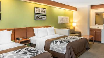 Suite, Multiple Beds, Non Smoking (2 Queen, 2 Person Sofa Bed) | In-room safe, iron/ironing board, travel cot, rollaway beds